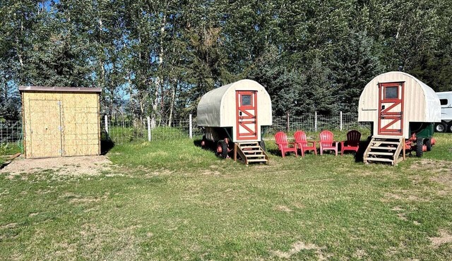 Rustic Sheep Wagon Glamping Retreat with Cowboy Ranch Views near Grand Tetons in Tetonia, Idaho