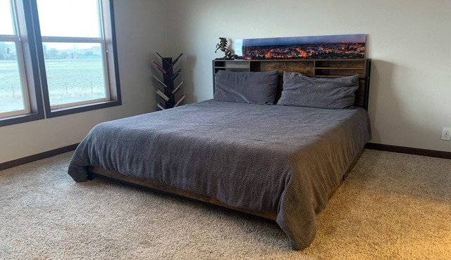 Spacious 4-bedroom house in charming rural Powell with media and fitness room