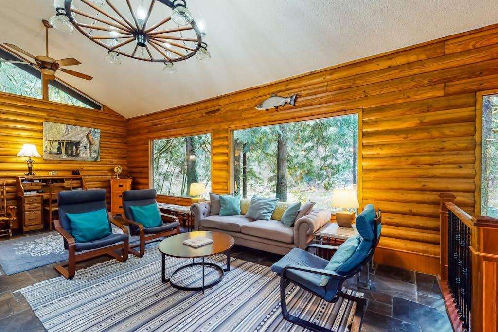 Washougal House | Spacious riverfront lodge with beach access private hot tub & forest views