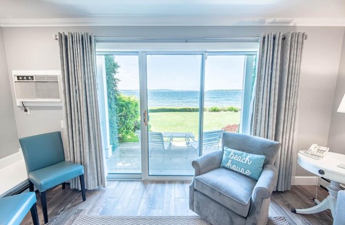Boyne City Condo | 112 Water Street | Lake Charlevoix Views | Private Patio and Beach |