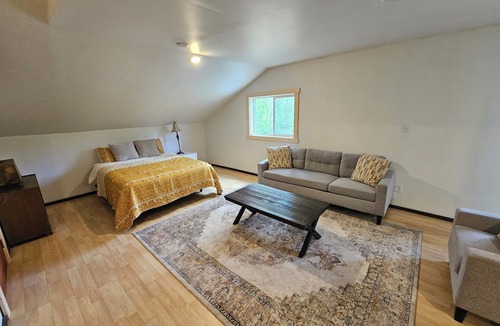 Kettle Falls House | Beautiful 5-bedroom log home with spacious rooms and rustic charm.