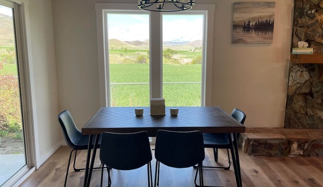Cozy home, sweeping views, minutes from biking, hiking, fishing, rafting.