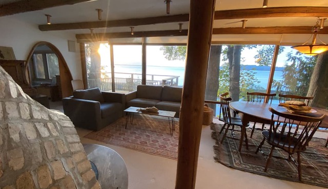 Enjoy big Salish Sea views in a hand hewn tree-like home on Picnic Point Lake